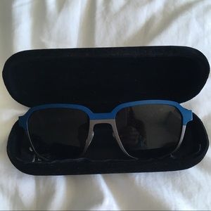 Two- toned Polarized SEE wear sunglasses.